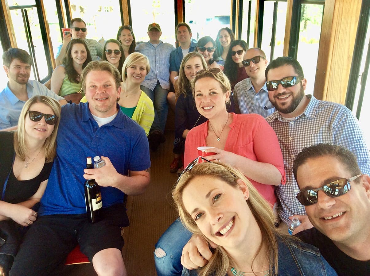 Guests enjoying a Taste of Lodi wine tour aboard the Trolley